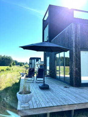 AITVARU TERASOS apartamentai pirmame aukšte su terasa į kanalą Svencelė